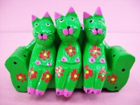 Family Of 3 Green Cats Sitting On A Green Sofa, Carved, Colored